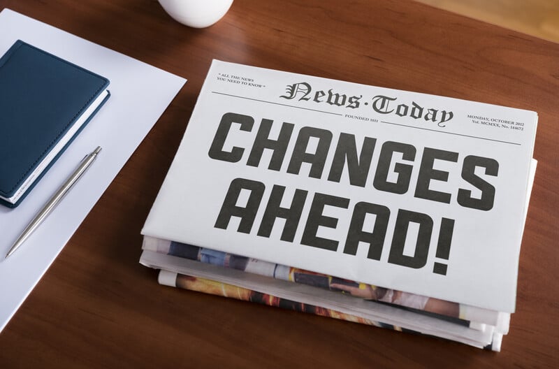 newspaper reading 'changes ahead'