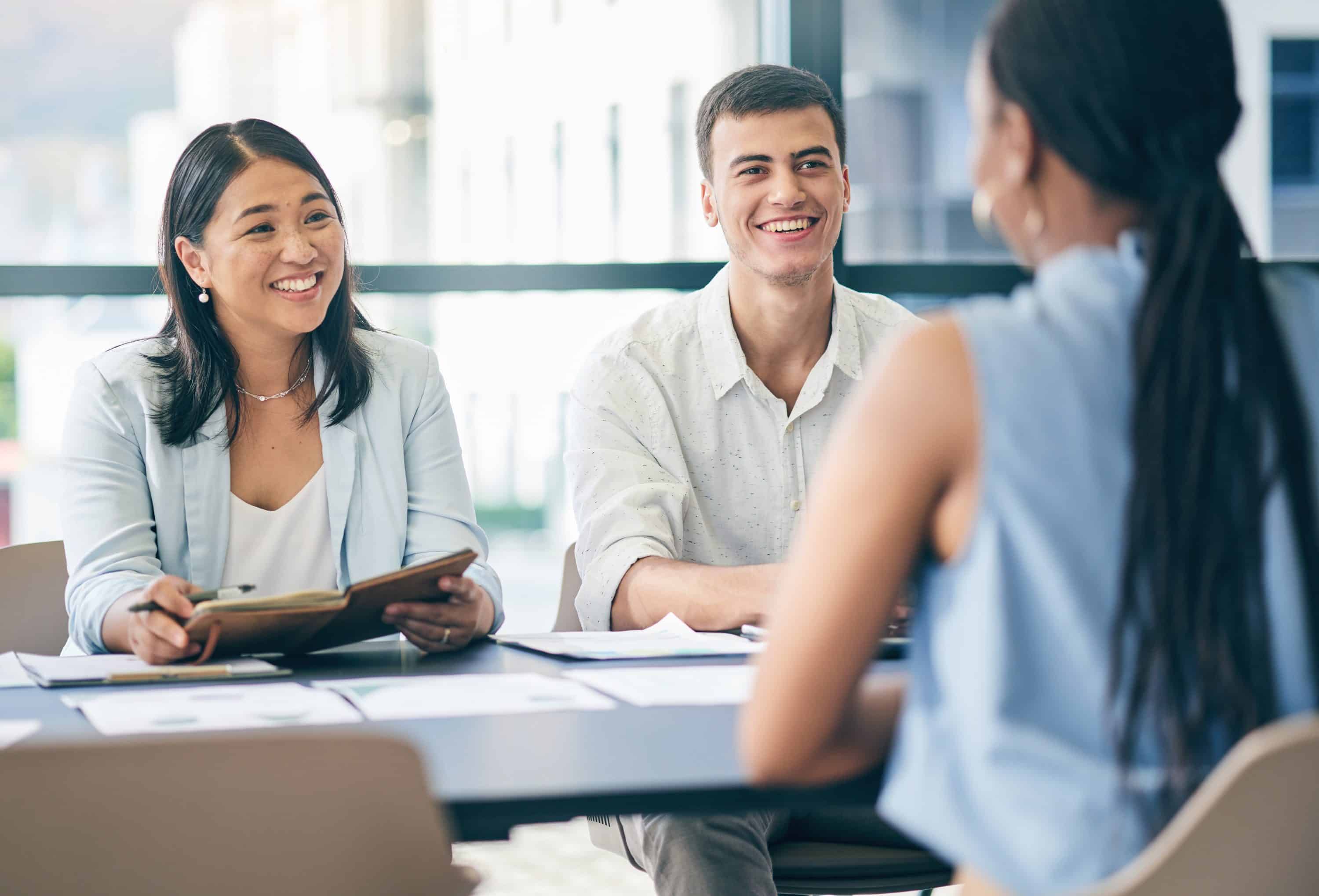 worker smiling hiring recruiting interviewing new worker scaled